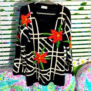 Eminent black cotton sweater with bright orange, yellow, green and pink flora